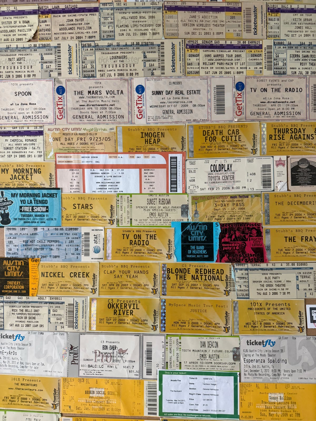 A poster collaged from dozens of concert ticket stubs from Austin venues.